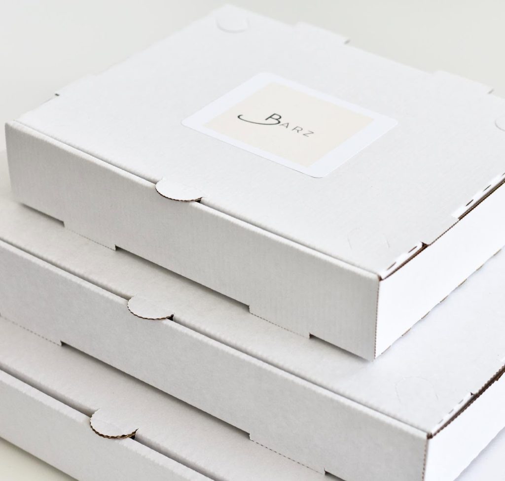 Stack of white Barz boxes